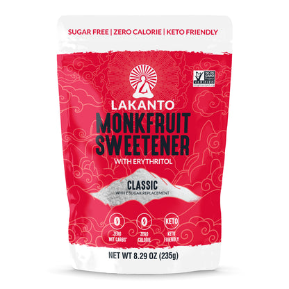 A red and white package of Lakanto Monkfruit Sweetener, featuring bold text stating Sugar Free, Zero Calorie, and Keto Friendly. The front displays a weight of 8.29 oz (235g) and a Non-GMO Project Verified seal.